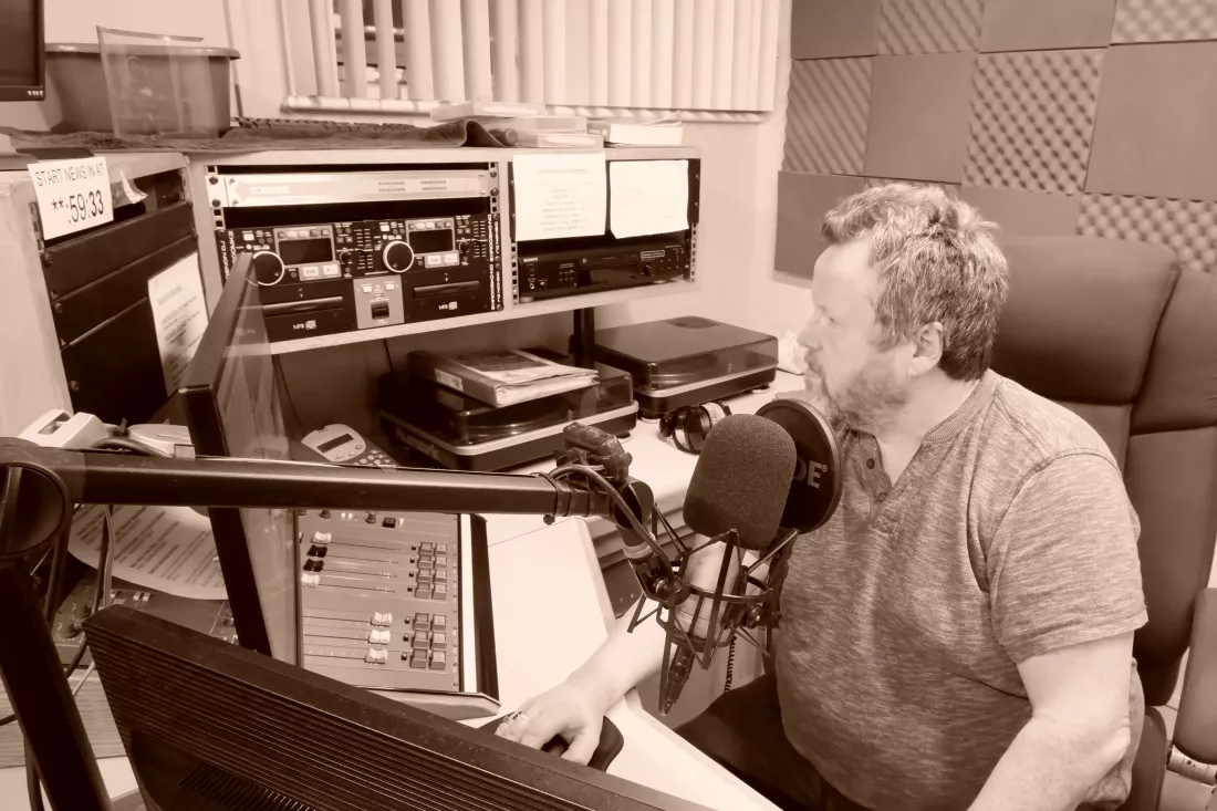 side-view-man-using-sound-mixer