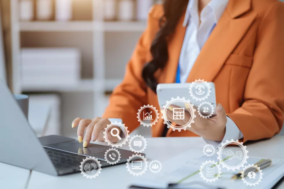 business-women-accountant-working-laptop-computer-with-business-document-graph-diagram-calculator-office-table-office