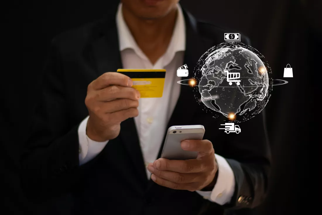 businessman-uses-online-shopping-card-pay-via-mobile-phone-network