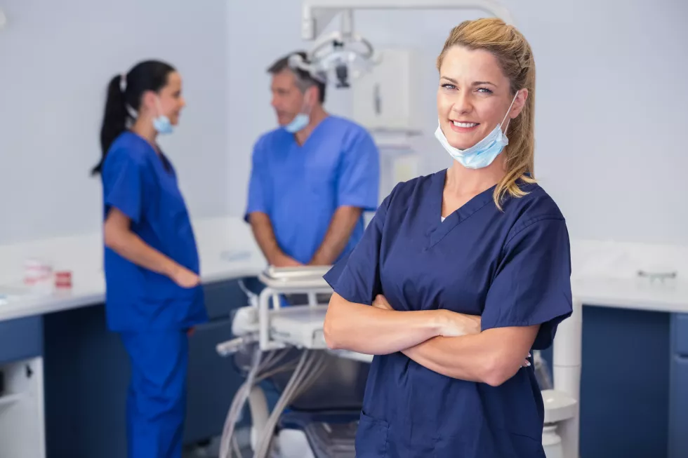 smiling-nurse-with-arms-crossed