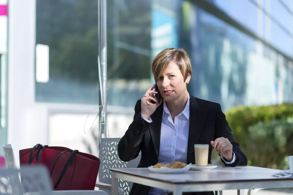 young-businesswoman-using-laptop-office