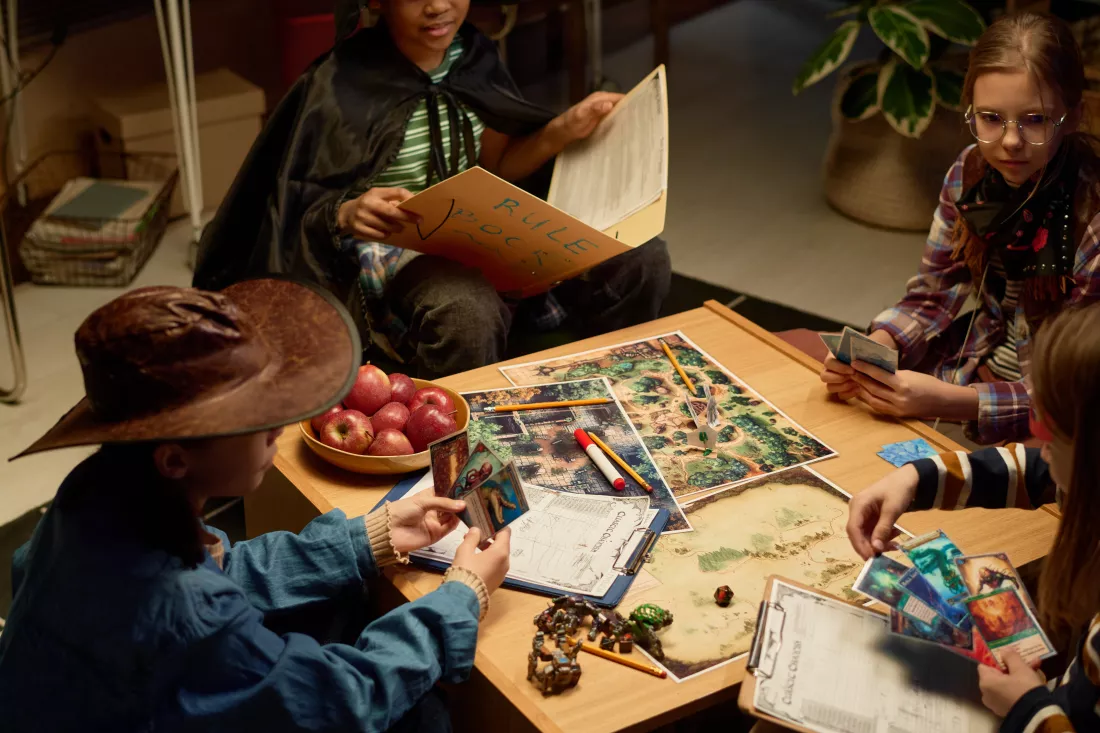 kids-costumes-playing-board-game
