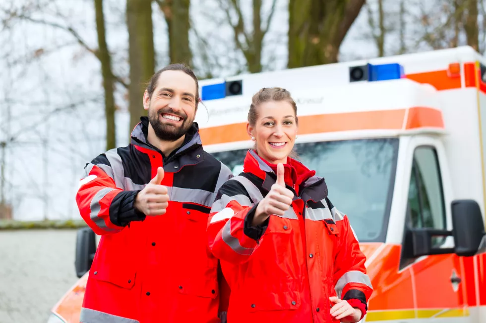 emergency-doctor-nurse-standing-front-ambulance