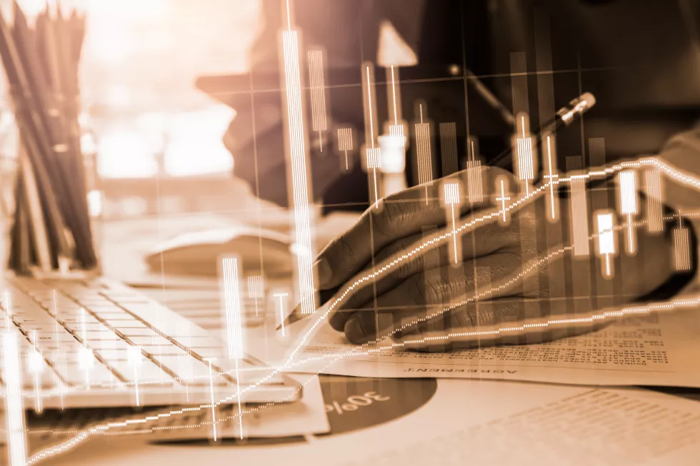 double-exposure-graph-person-writing-table