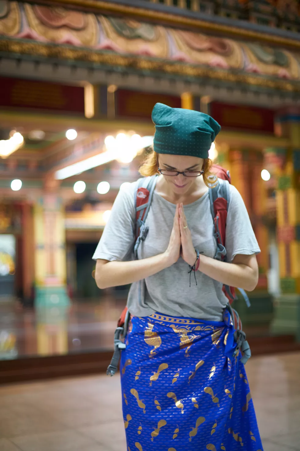 woman-praying-with-hands-together