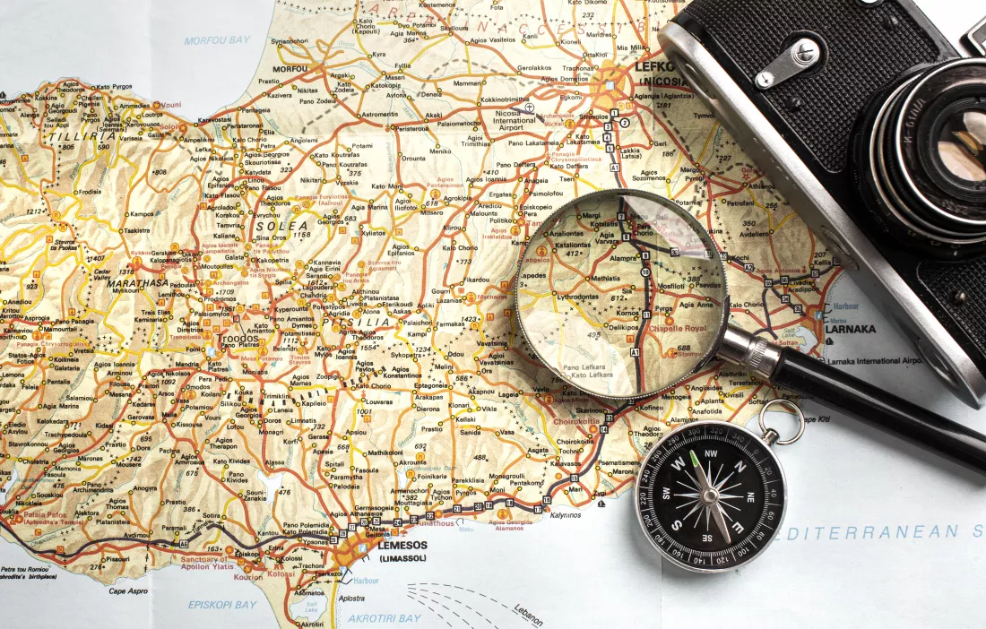 flat-lay-travel-set-with-map-camera