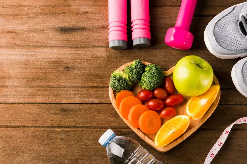 fresh-fruits-vegetables-heart-plate-wood