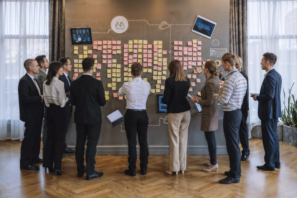 photo-corporate-crowd-engaging-teamwork-business-event-modern-office-space
