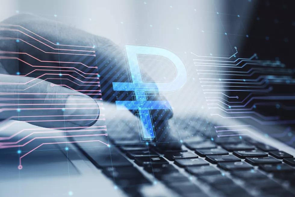 close-up-businessman-hands-using-laptop-computer-with-creative-glowing-russian-ruble-circuit-hologram-blurry-background-digital-money-online-banking-concept-double-exposure