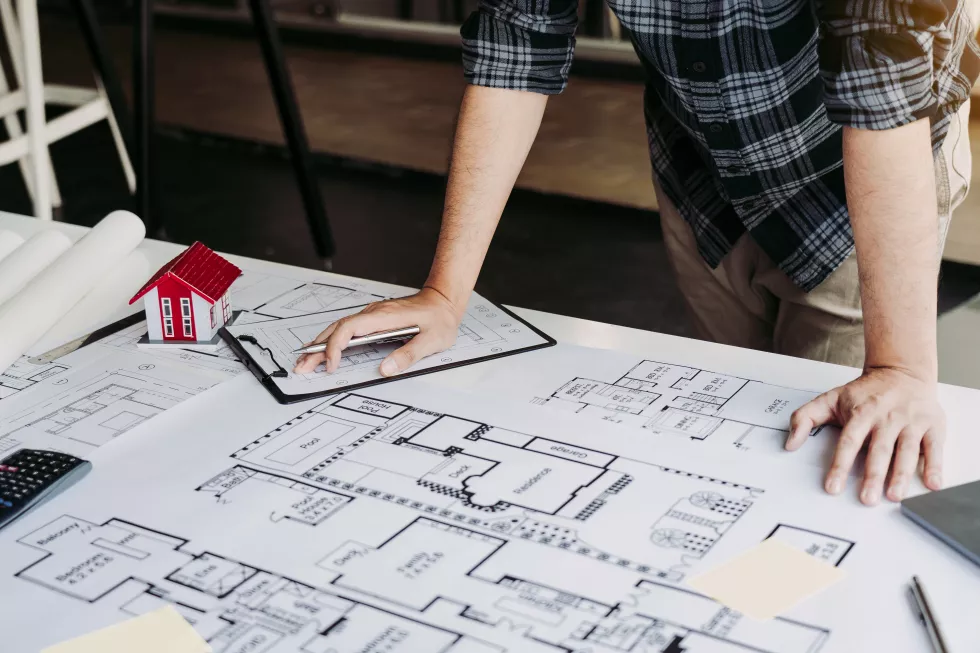 high-angle-view-woman-reading-book-table