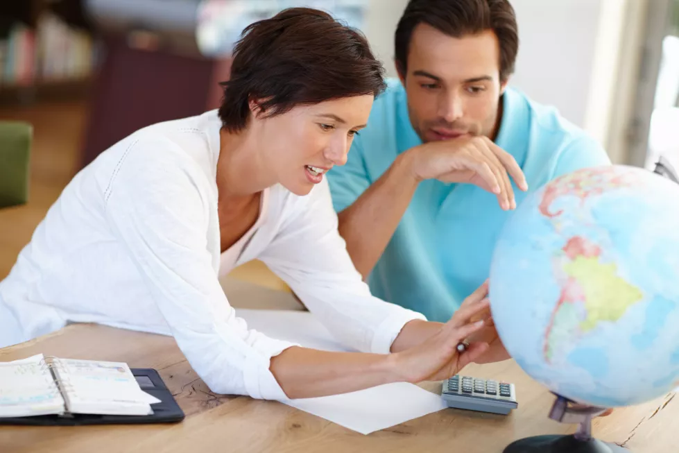 couple-planning-globe-home-travel-vacation-location-destination-choice-man-woman-world-map-holiday-budget-journey-cost-trip-expenses-with-earth-tourism-together