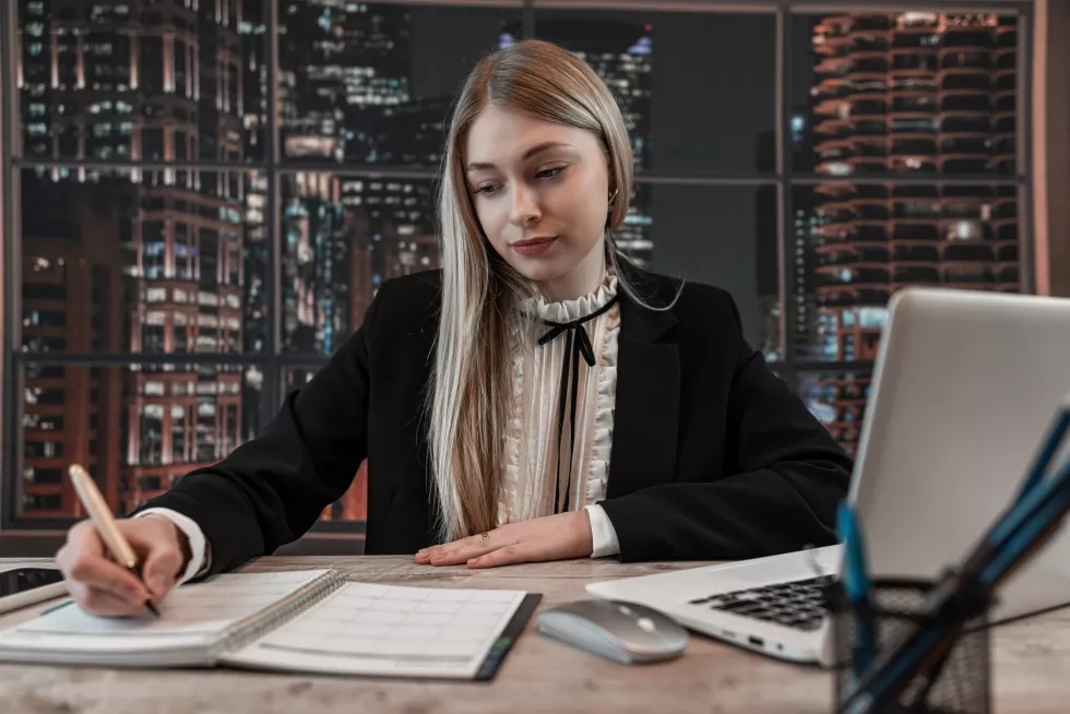 young-business-woman-working-with-computer-write-ntepad-office-female-consultant-manager-employed-job