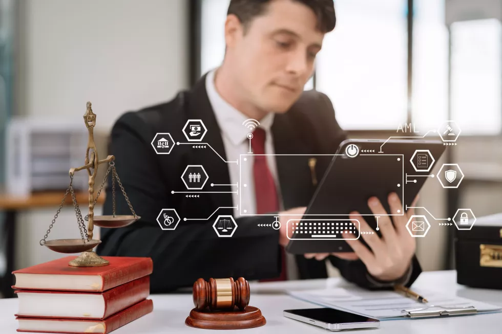 justice-law-concept-male-judge-courtroom-with-gavel-working-with-digital-tablet-computer-docking-keyboard-table