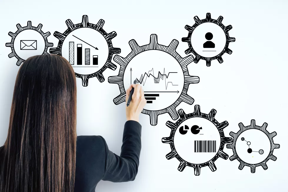 businesswoman-drawing-creative-cogwheels-sketch-concrete-wall-background-engineering-success-concept