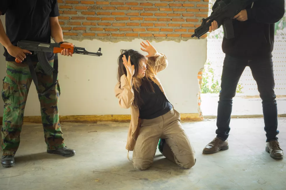low-section-men-by-trapped-woman-floor