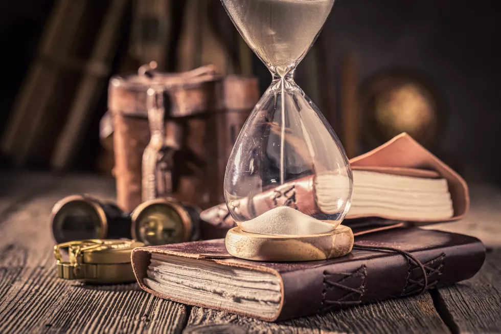 old-hourglass-journal-as-journey-memories-concept