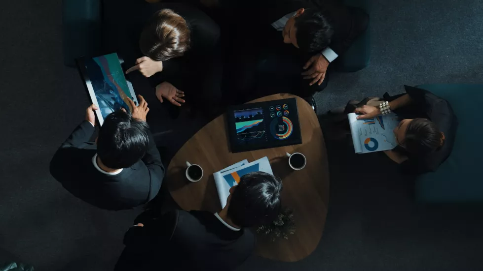 top-view-smart-team-analysis-graph-while-leader-present-chart-directorate