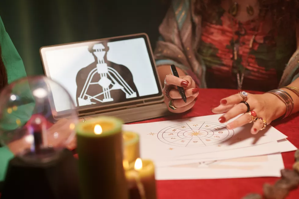 fortune-teller-reading-interpreting-astrology-birth-chart