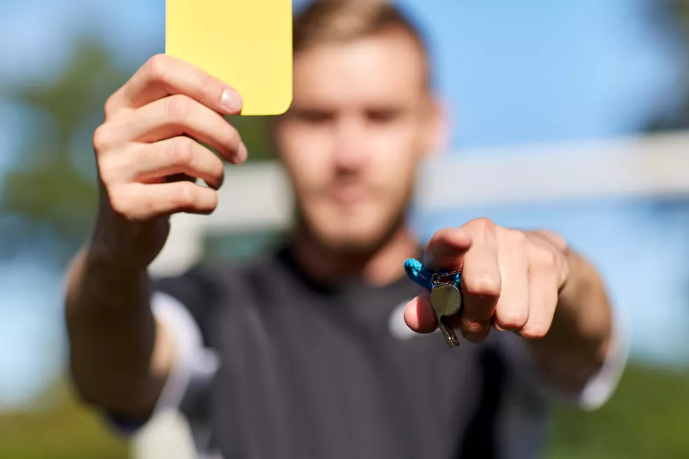 sport-caution-game-people-referee-with-whistle-showing-yellow-card-football-field
