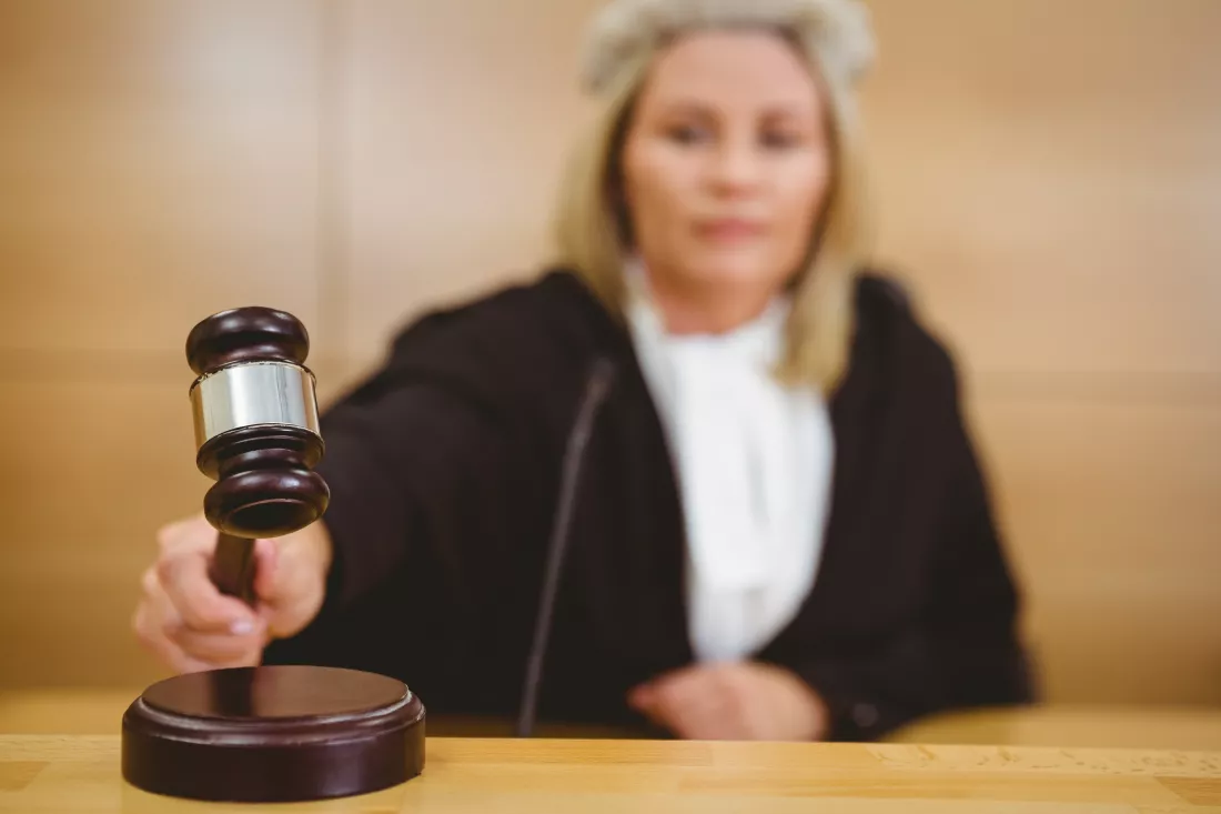 serious-judge-with-gavel-wearing-robes-wig
