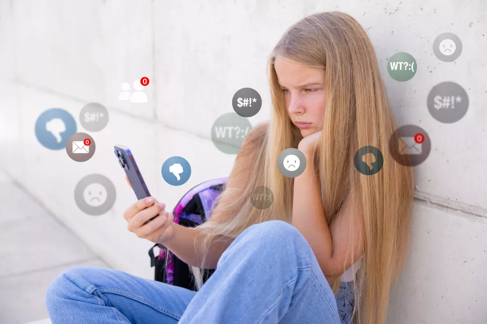 sad-girl-viewing-negative-reactions-comments-social-media-concept-children-online-bullying