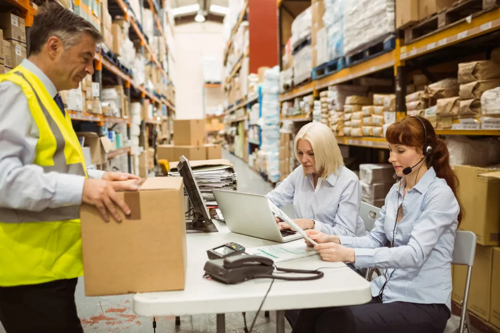 warehouse-team-working-together-shipment