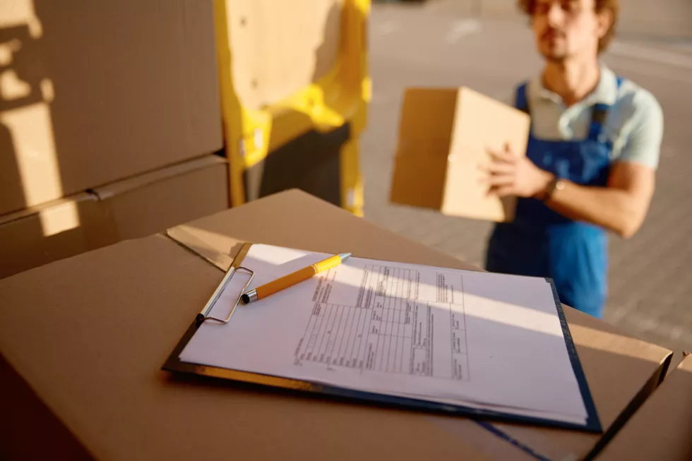 closeup-delivery-document-application-form-package-receiving-by-customer-freight-transportation-parcel-delivery-service